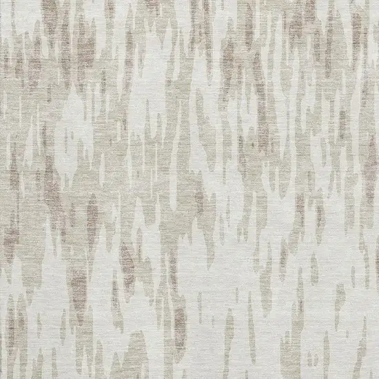 Ivory And Beige Abstract Washable Area Rug With UV Protection Photo 2