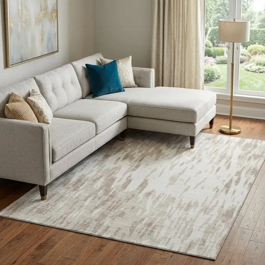 Ivory And Beige Abstract Washable Area Rug With UV Protection Photo 1