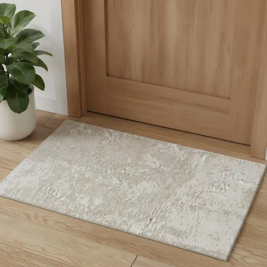 Ivory And Beige Abstract Washable Area Rug With UV Protection Photo 1