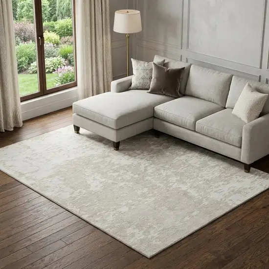 Ivory And Beige Abstract Washable Area Rug With UV Protection Photo 1
