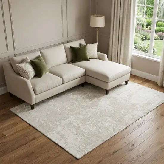 Ivory And Beige Abstract Washable Area Rug With UV Protection Photo 1