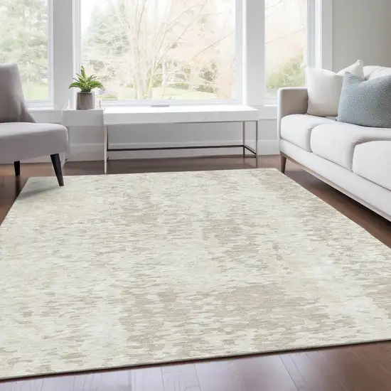 Ivory And Beige Abstract Washable Area Rug With UV Protection Photo 4