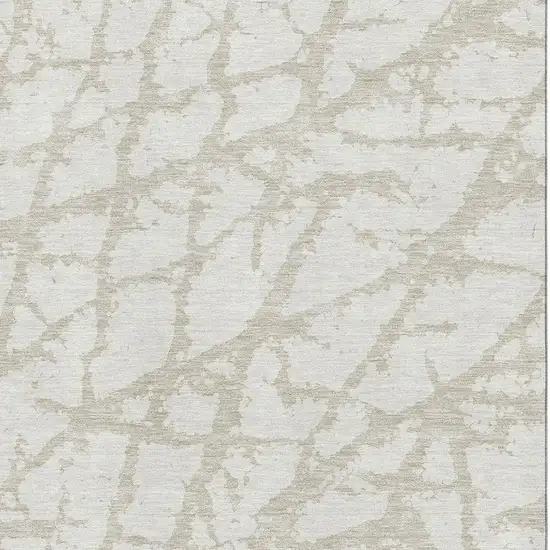 Ivory And Beige Abstract Washable Area Rug With UV Protection Photo 3