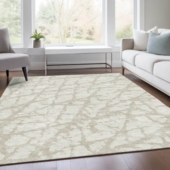 Ivory And Beige Abstract Washable Area Rug With UV Protection Photo 5