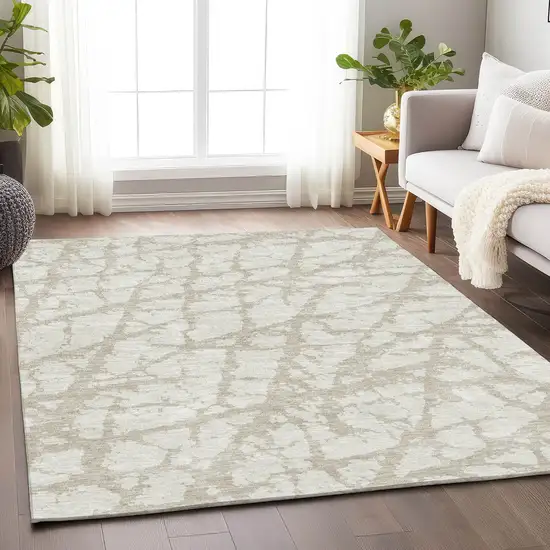 Ivory And Beige Abstract Washable Area Rug With UV Protection Photo 4