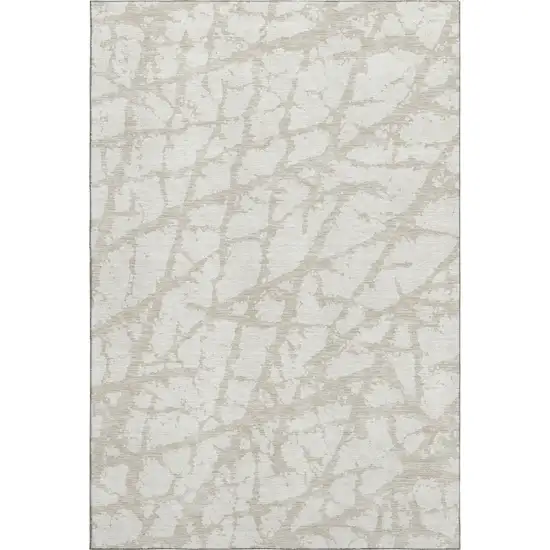 Ivory And Beige Abstract Washable Area Rug With UV Protection Photo 1