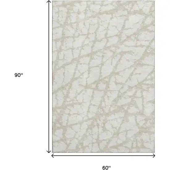 Ivory And Beige Abstract Washable Area Rug With UV Protection Photo 8