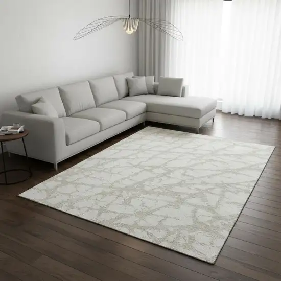 Ivory And Beige Abstract Washable Area Rug With UV Protection Photo 2