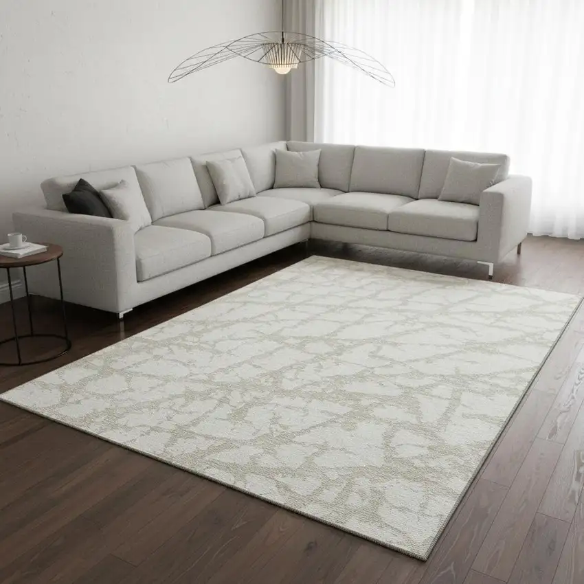 Ivory And Beige Abstract Washable Area Rug With UV Protection Photo 2