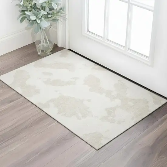 Ivory And Beige Abstract Washable Area Rug With UV Protection Photo 2