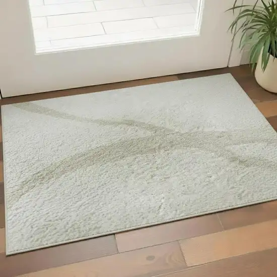 Ivory And Beige Abstract Washable Area Rug With UV Protection Photo 2