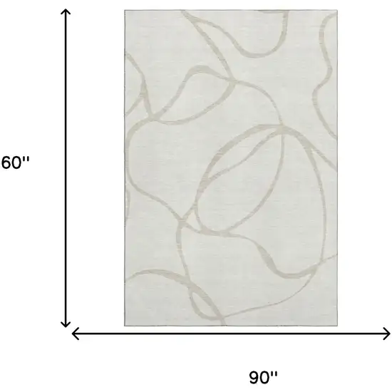 Ivory And Beige Abstract Washable Area Rug With UV Protection Photo 6