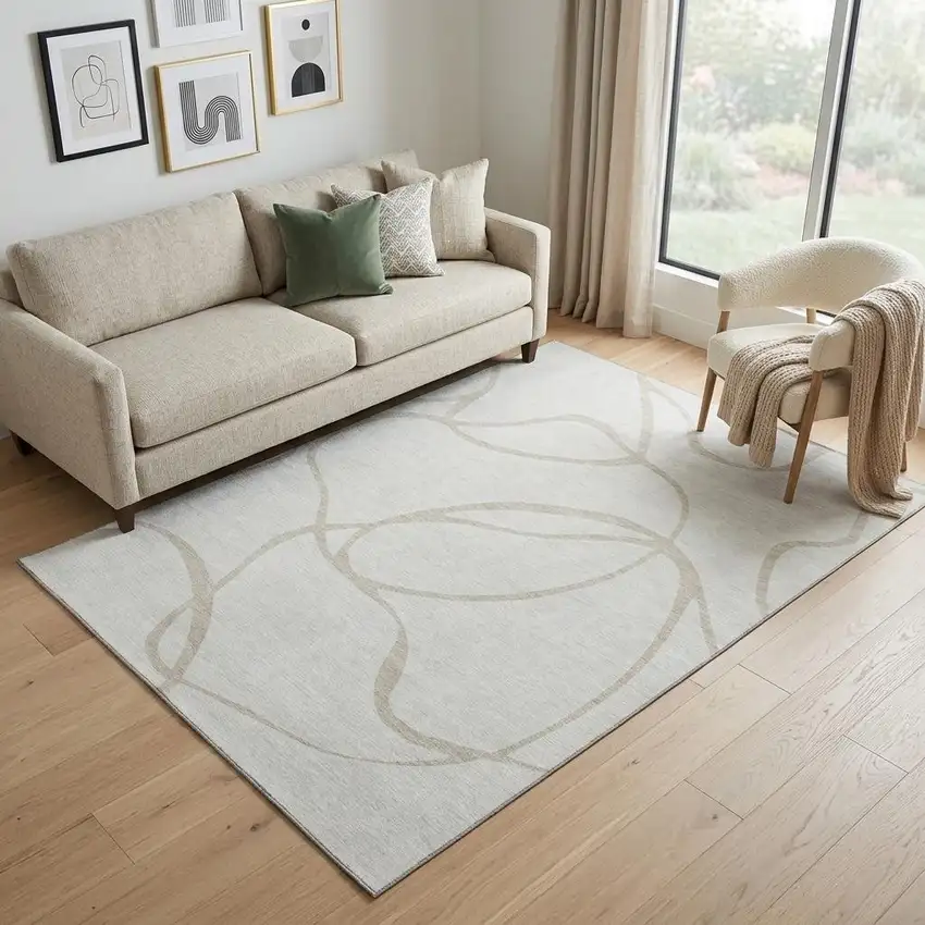Ivory And Beige Abstract Washable Area Rug With UV Protection Photo 1