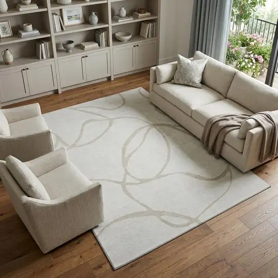 Ivory And Beige Abstract Washable Area Rug With UV Protection Photo 1
