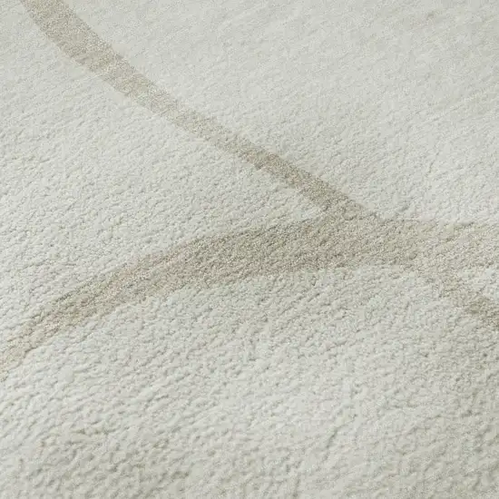 Ivory And Beige Abstract Washable Area Rug With UV Protection Photo 1