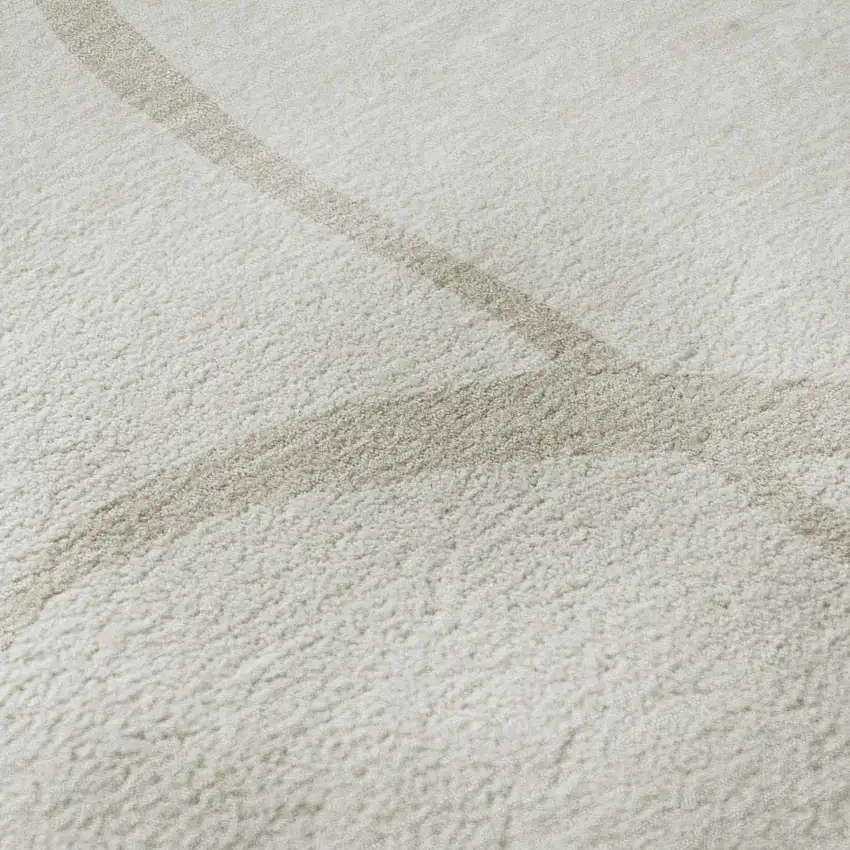 Ivory And Beige Abstract Washable Area Rug With UV Protection Photo 1