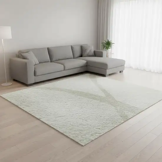 Ivory And Beige Abstract Washable Area Rug With UV Protection Photo 2