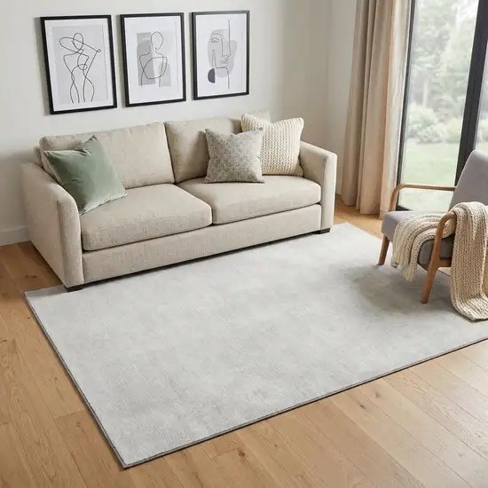 Ivory And Beige Abstract Washable Area Rug With UV Protection Photo 1