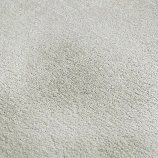 Ivory And Beige Abstract Washable Area Rug With UV Protection Photo 3