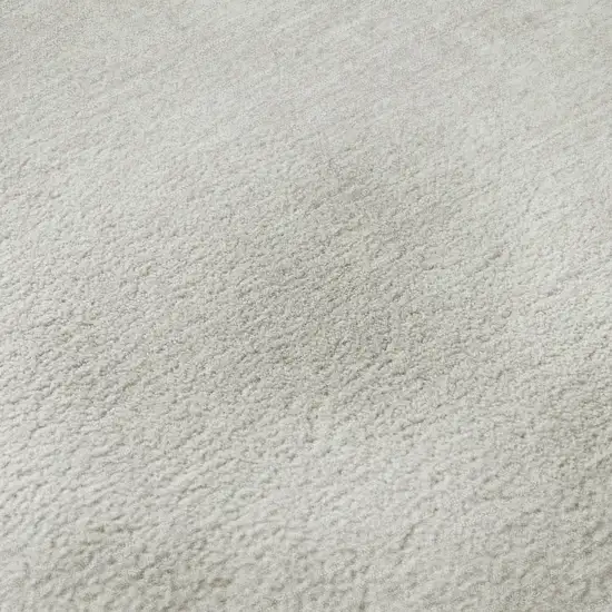 Ivory And Beige Abstract Washable Area Rug With UV Protection Photo 1