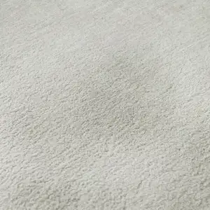 Photo of Ivory And Beige Abstract Washable Area Rug With UV Protection