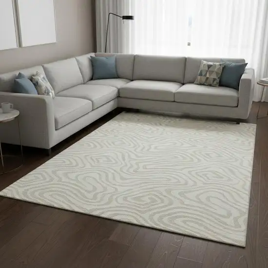 Ivory And Beige Abstract Washable Area Rug With UV Protection Photo 2