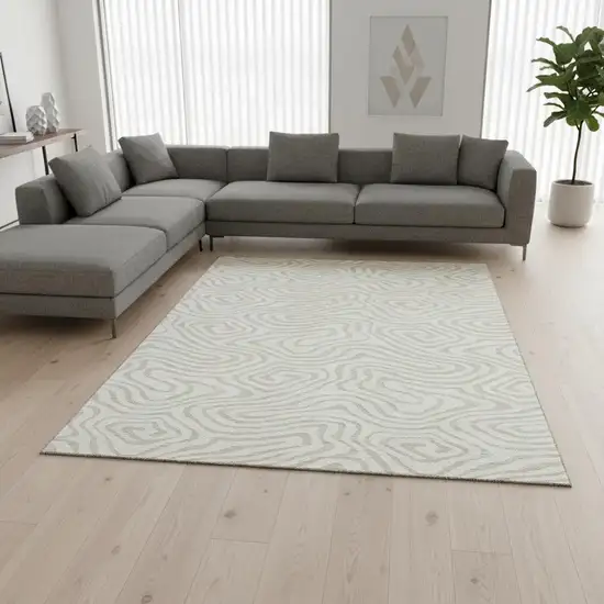 Ivory And Beige Abstract Washable Area Rug With UV Protection Photo 2