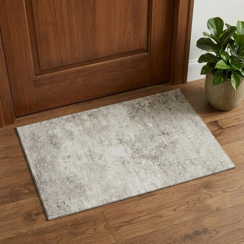 Ivory And Beige Abstract Washable Area Rug With UV Protection Photo 1