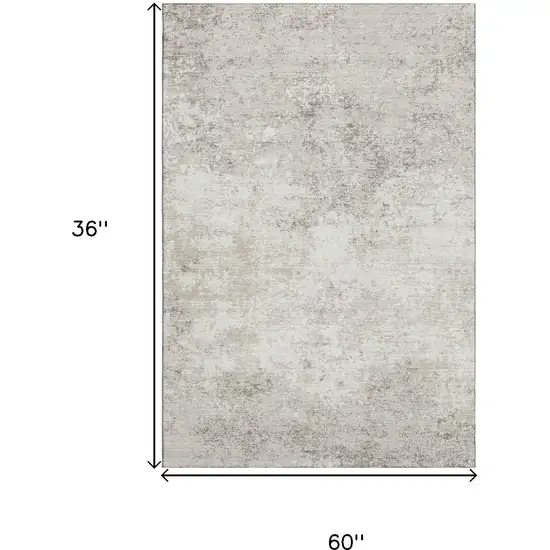 Ivory And Beige Abstract Washable Area Rug With UV Protection Photo 9