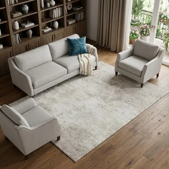 Ivory And Beige Abstract Washable Area Rug With UV Protection Photo 1