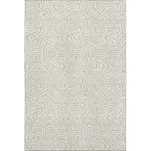 Photo of Ivory And Beige Abstract Washable Area Rug With UV Protection
