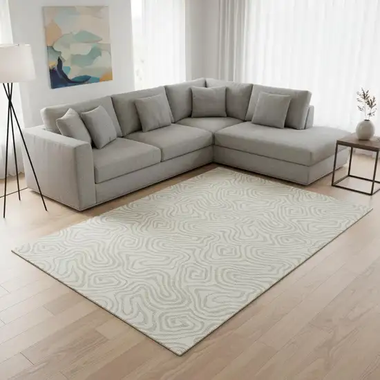 Ivory And Beige Abstract Washable Area Rug With UV Protection Photo 2