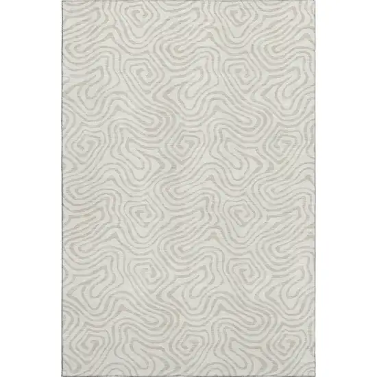 Ivory And Beige Abstract Washable Area Rug With UV Protection Photo 1
