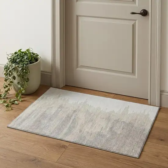 Ivory And Beige Abstract Washable Area Rug With UV Protection Photo 1