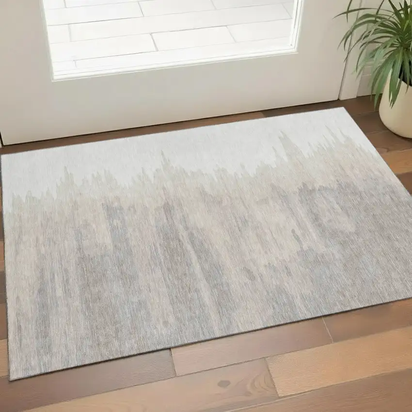 Ivory And Beige Abstract Washable Area Rug With UV Protection Photo 1