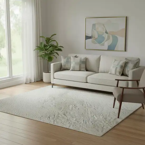 Ivory And Beige Abstract Washable Area Rug With UV Protection Photo 1