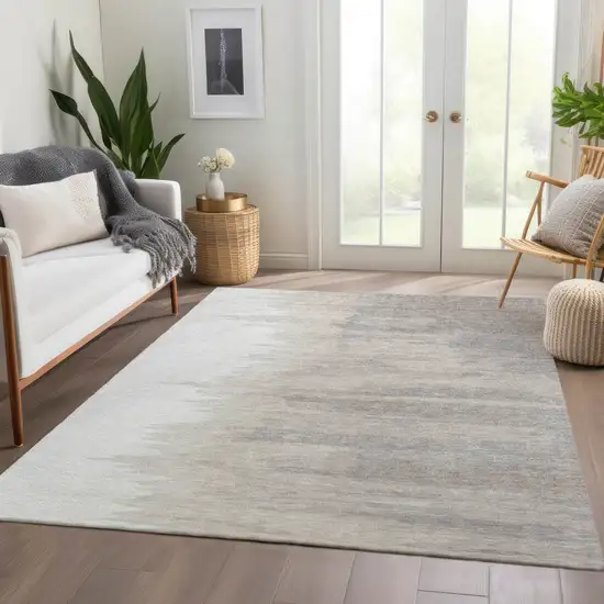 Ivory And Beige Abstract Washable Area Rug With UV Protection Photo 4