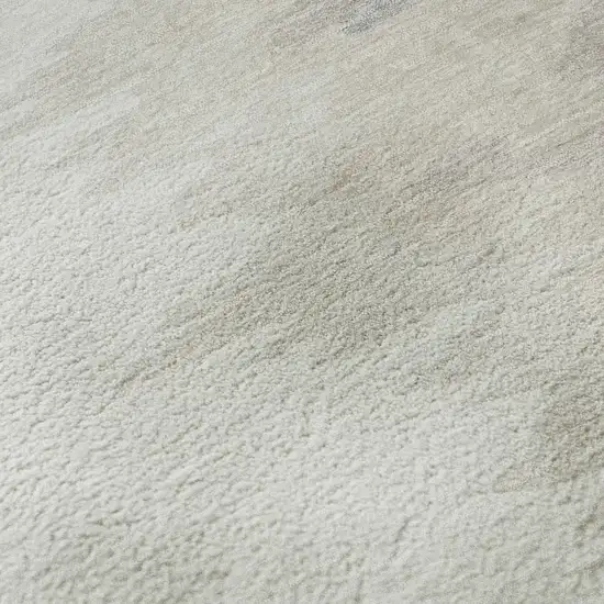 Ivory And Beige Abstract Washable Area Rug With UV Protection Photo 1