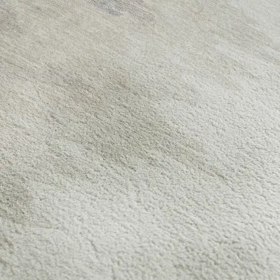 Ivory And Beige Abstract Washable Area Rug With UV Protection Photo 3