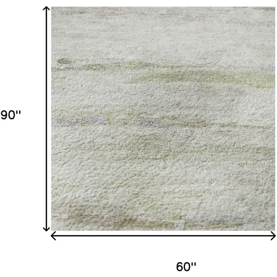 Ivory And Beige Abstract Washable Area Rug With UV Protection Photo 9