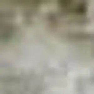 Photo of Ivory And Beige Abstract Washable Area Rug With UV Protection