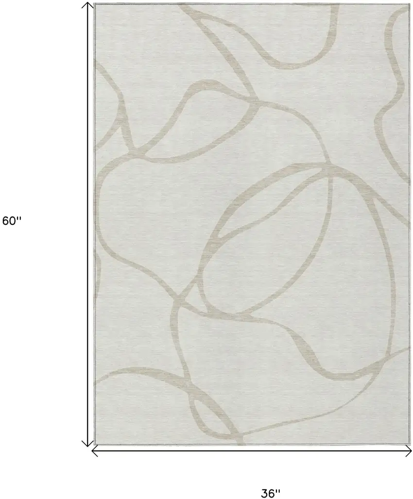Ivory And Beige Abstract Washable Indoor Outdoor Area Rug Photo 3