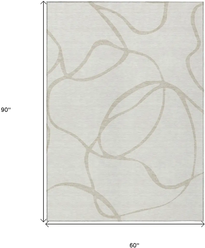 Ivory And Beige Abstract Washable Indoor Outdoor Area Rug Photo 3
