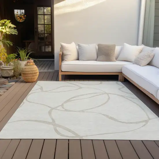 Ivory And Beige Abstract Washable Indoor Outdoor Area Rug Photo 7