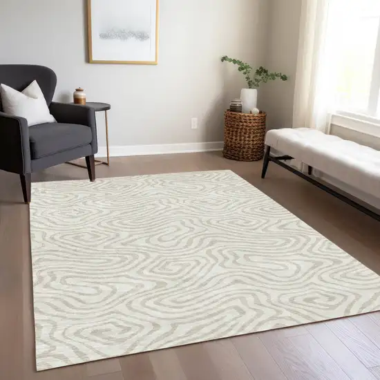 Ivory And Beige Abstract Washable Indoor Outdoor Area Rug Photo 9