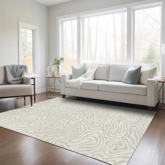 Ivory And Beige Abstract Washable Indoor Outdoor Area Rug Photo 9
