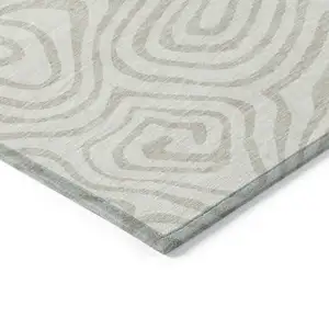 Photo of Ivory And Beige Abstract Washable Indoor Outdoor Area Rug