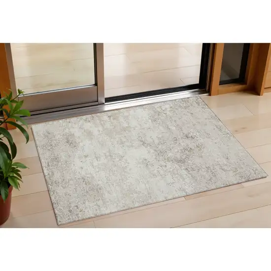 Ivory And Beige Abstract Washable Indoor Outdoor Area Rug Photo 1
