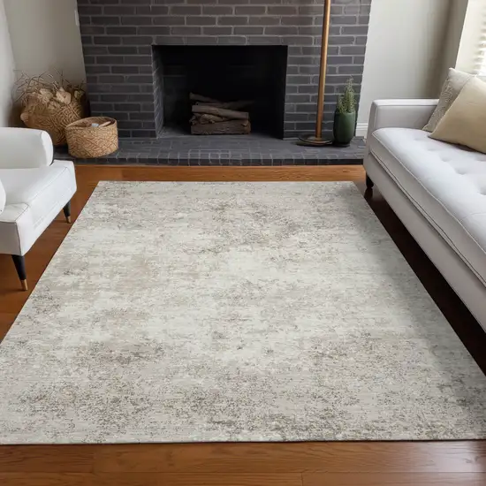 Ivory And Beige Abstract Washable Indoor Outdoor Area Rug Photo 9