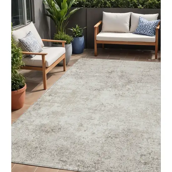 Ivory And Beige Abstract Washable Indoor Outdoor Area Rug Photo 1
